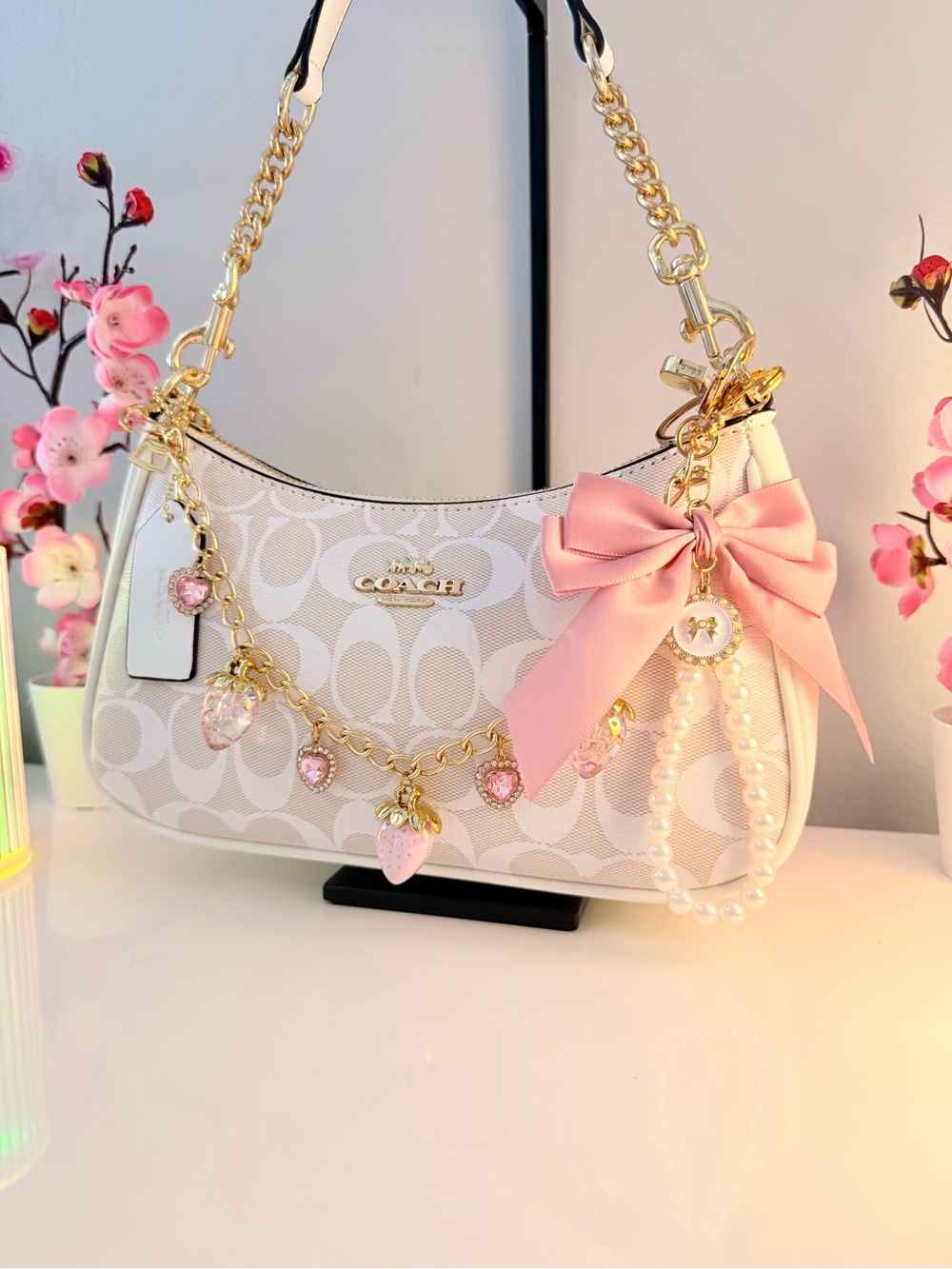 Coach Cream Logo Shoulder Bag with Pink Bow Charm